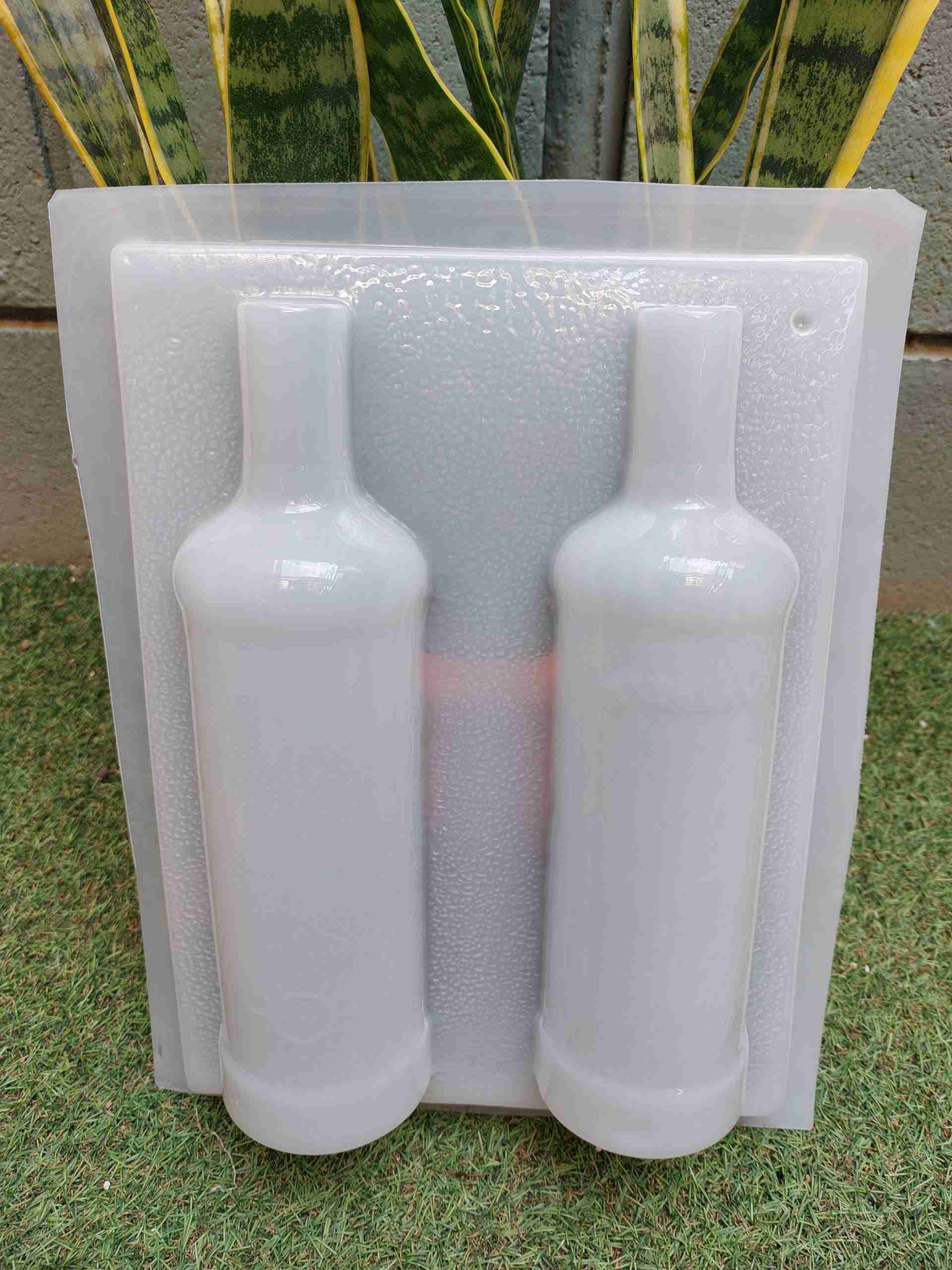 Molde botella ron Antillano